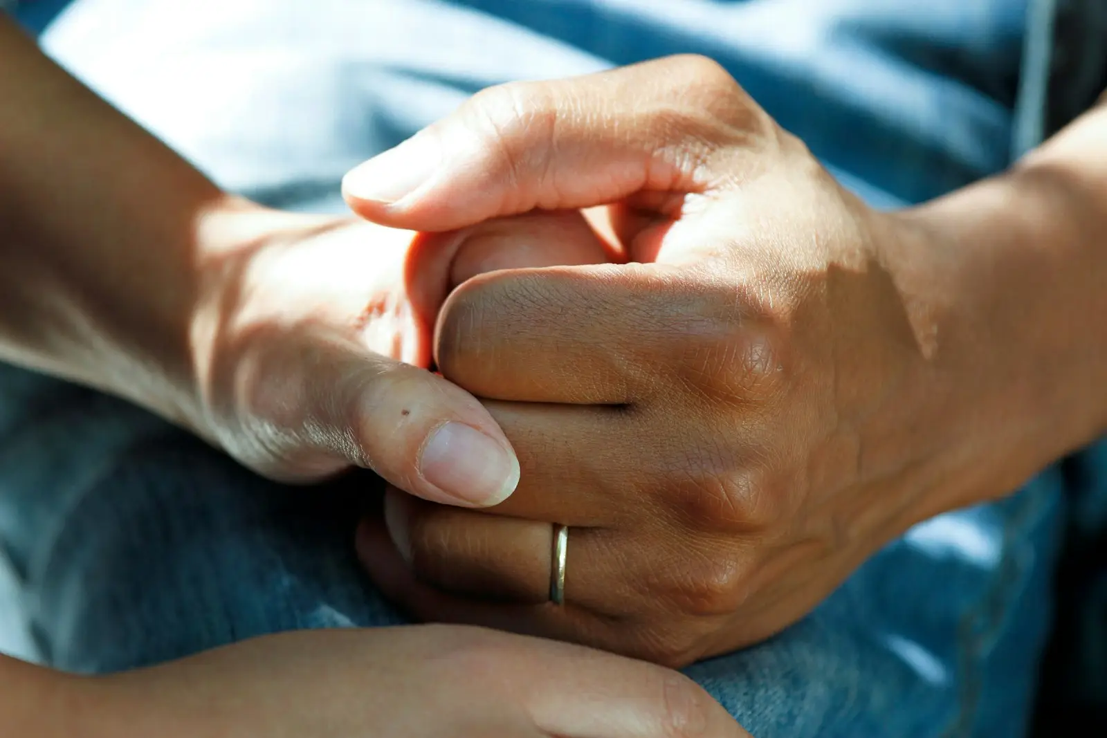 Comforting hands together