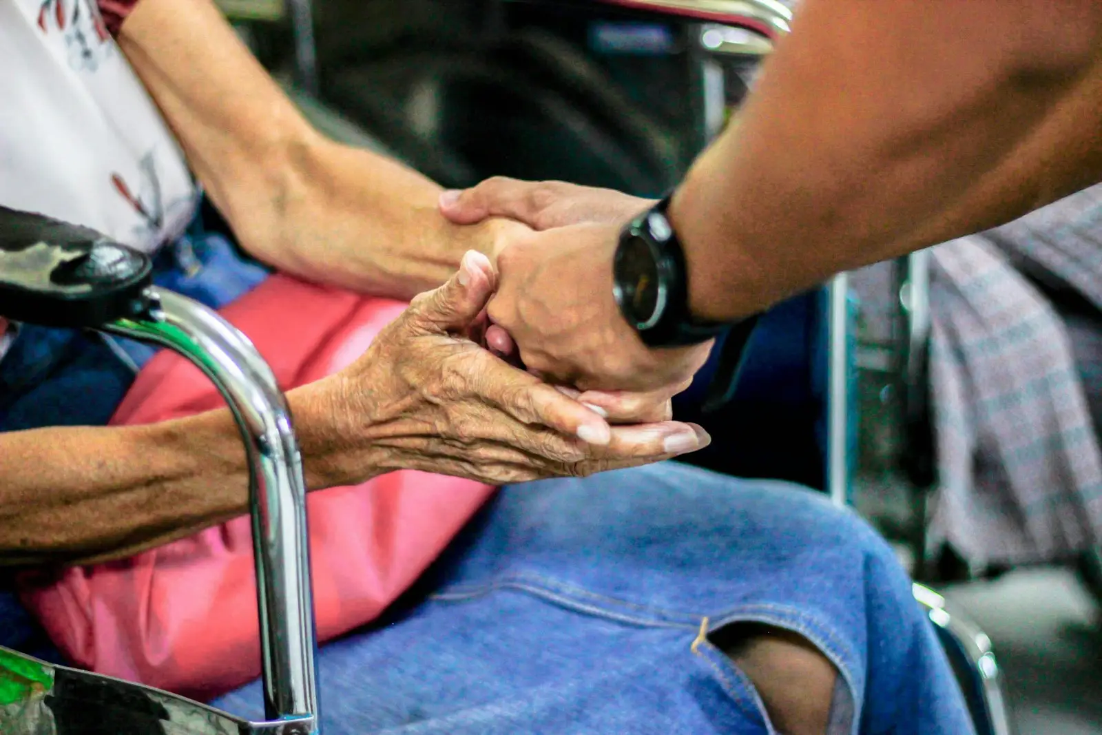 A caring hand held gently