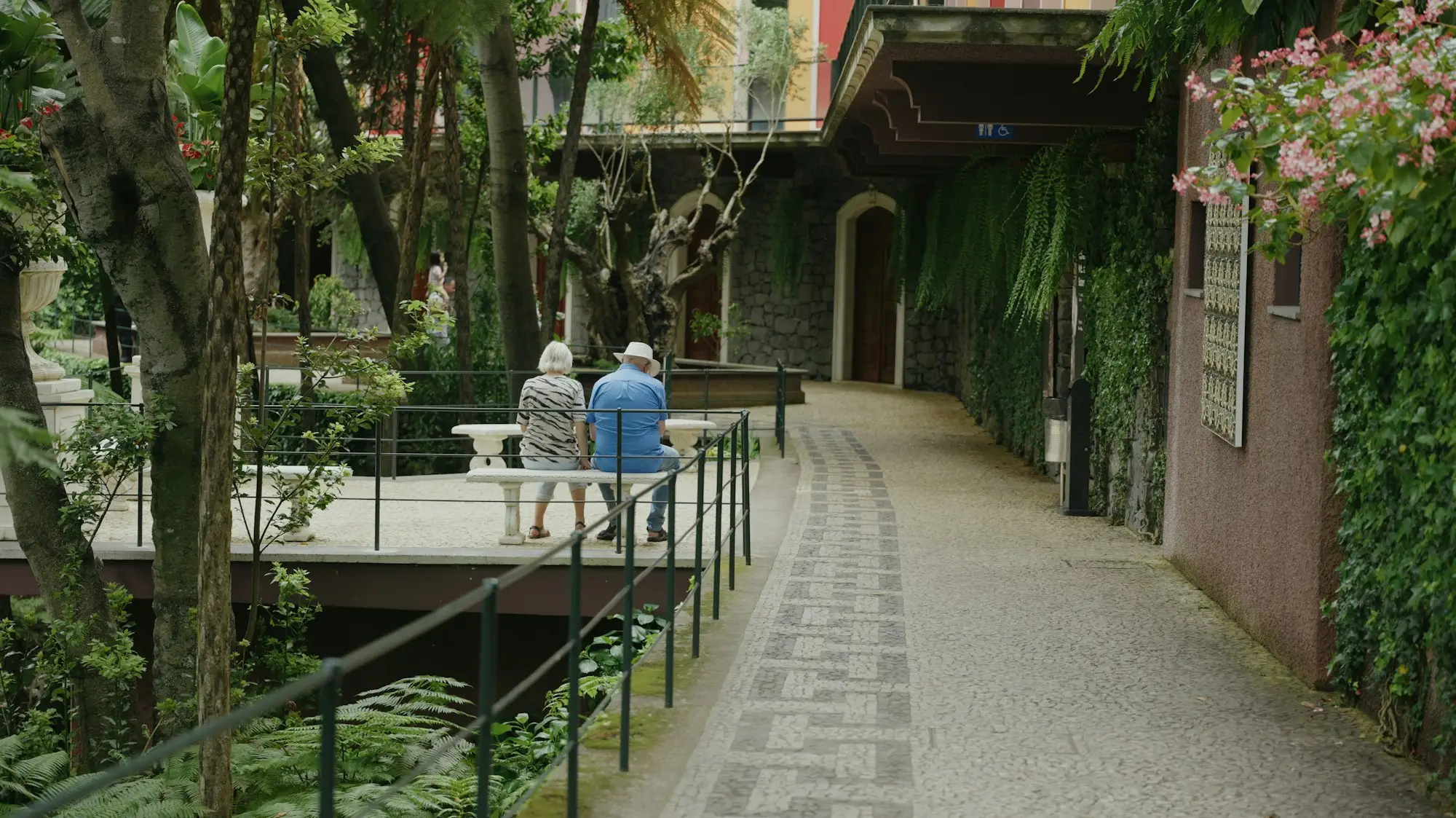 Residents relaxing on a garden bench